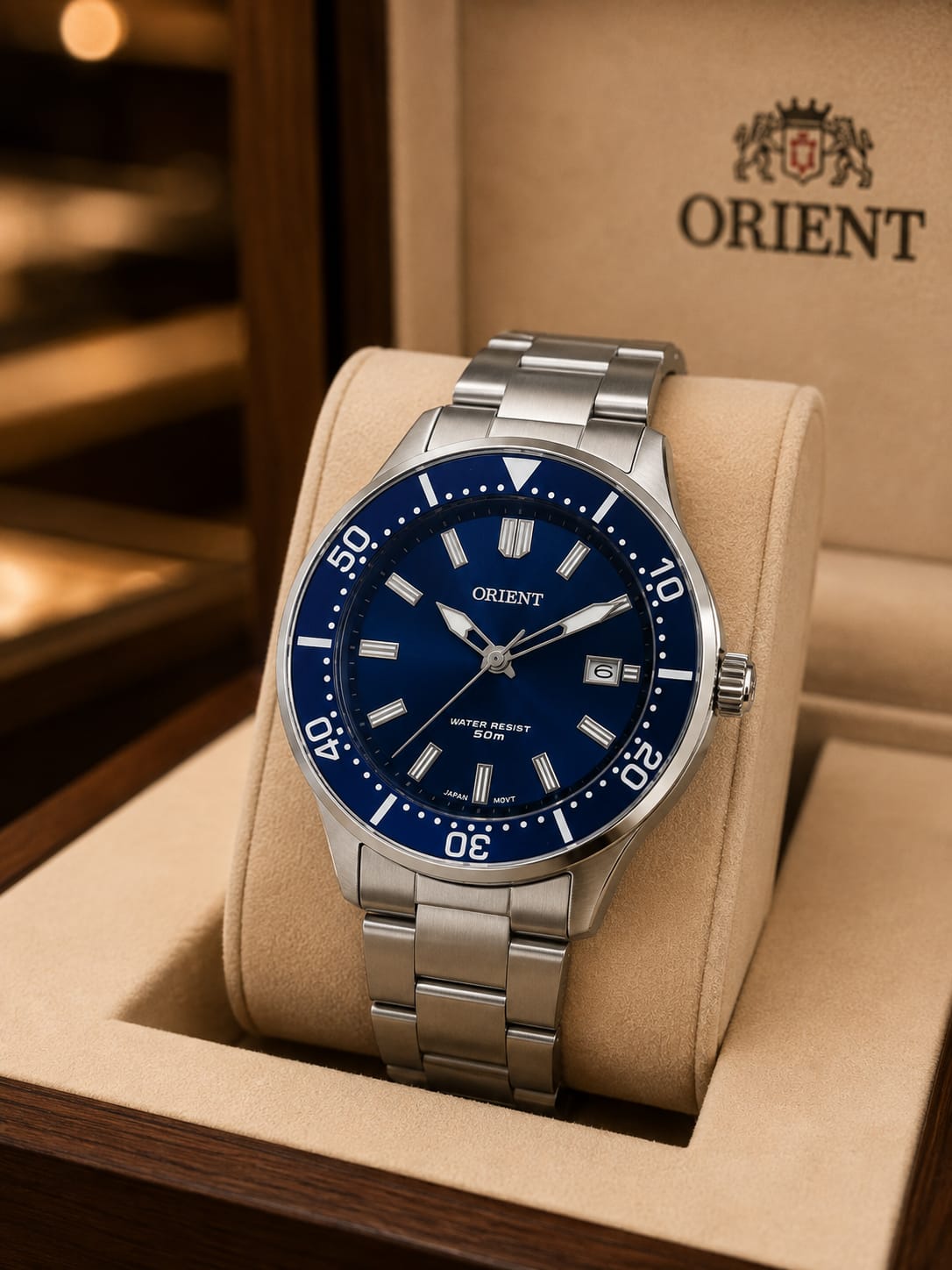 Relógio Orient quartzo com mostrador azul e pulseira prateada - 5atm